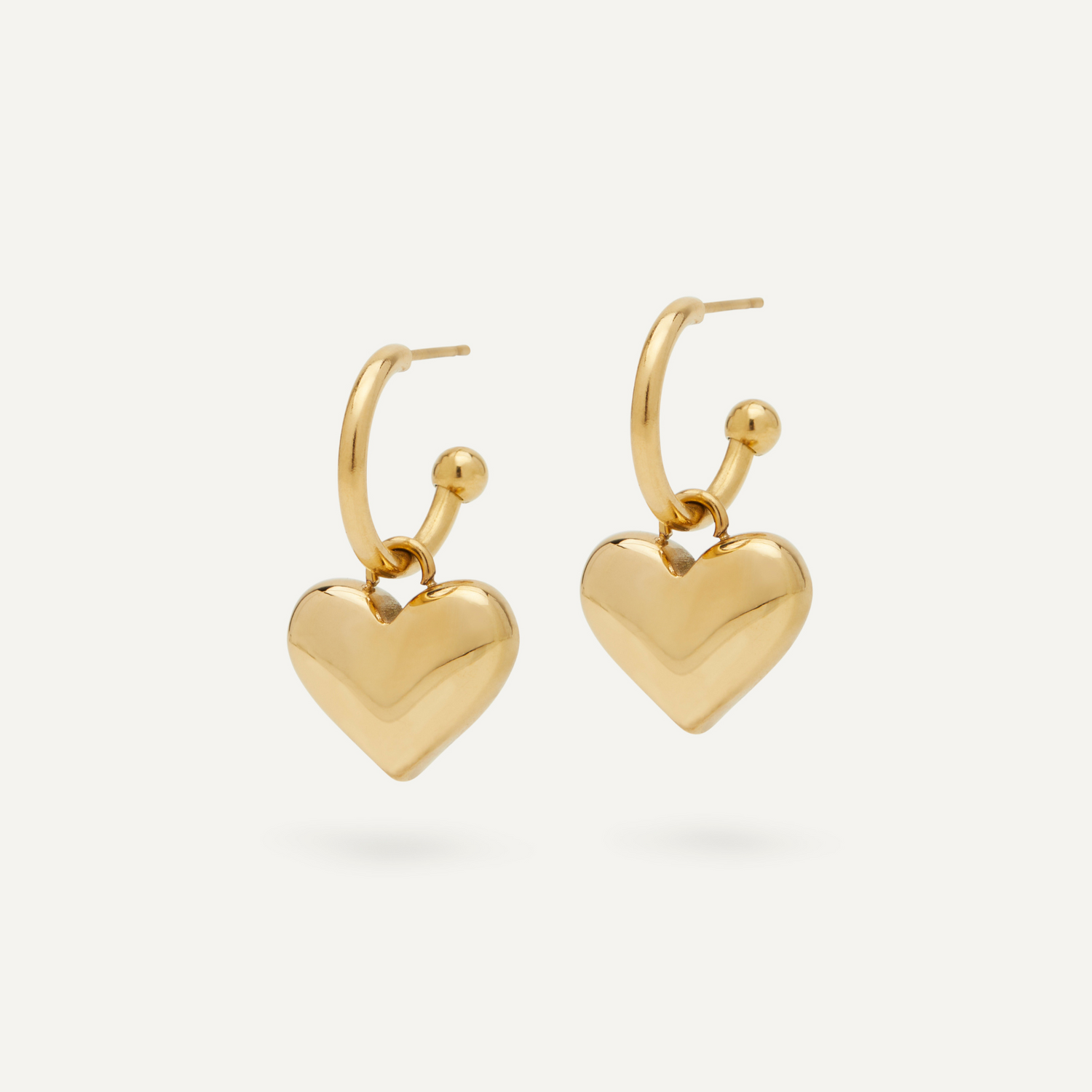 Gold hoop sales earrings with heart